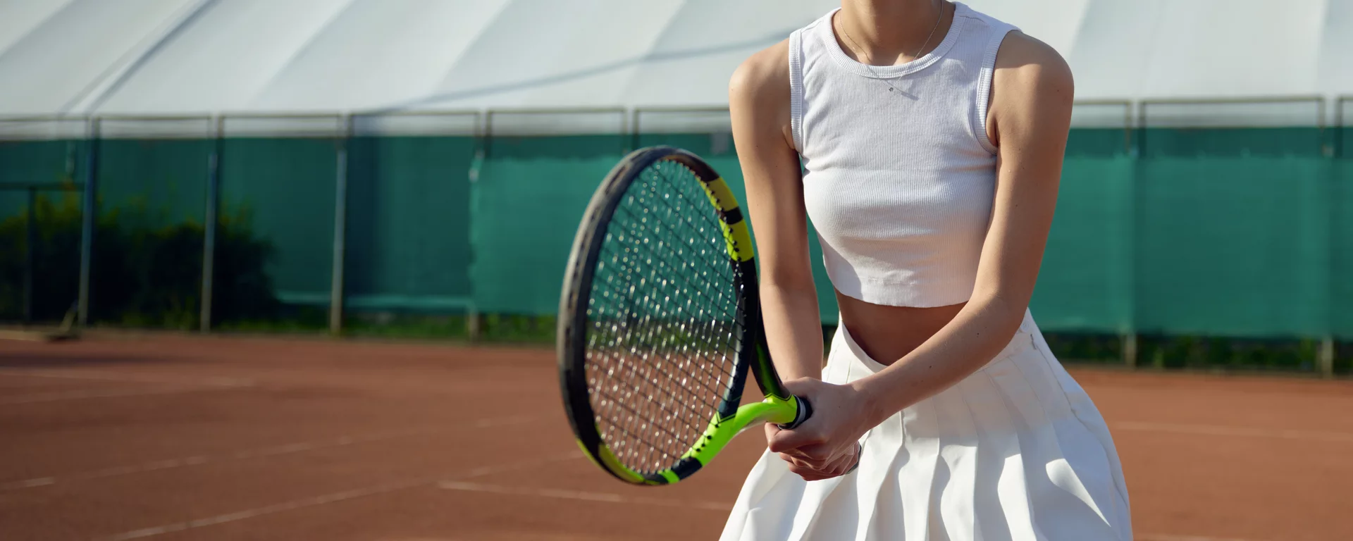 Female tennis player on outdoor court